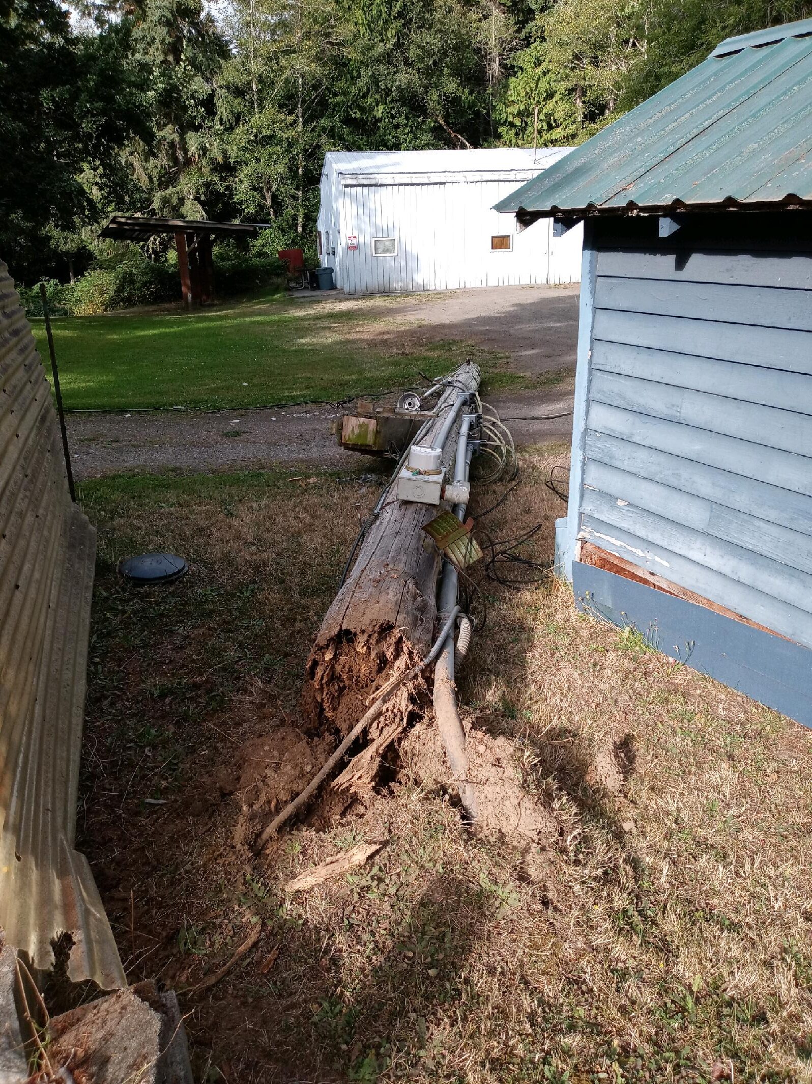 Broken Utility Pole, Emergency Replacement Needed.